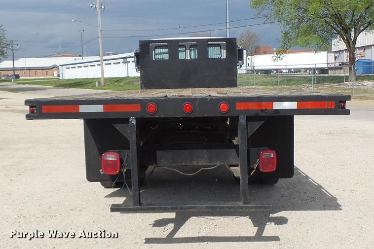 image for item DA3462 1999 Freightliner FL60 flatbed truck