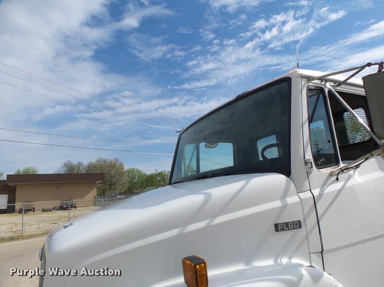 image for item DA3462 1999 Freightliner FL60 flatbed truck