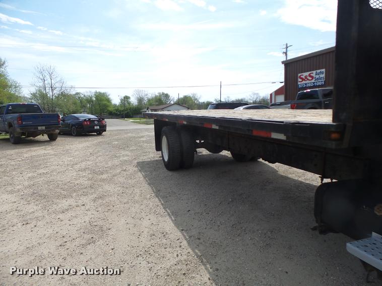 image for item DA3462 1999 Freightliner FL60 flatbed truck