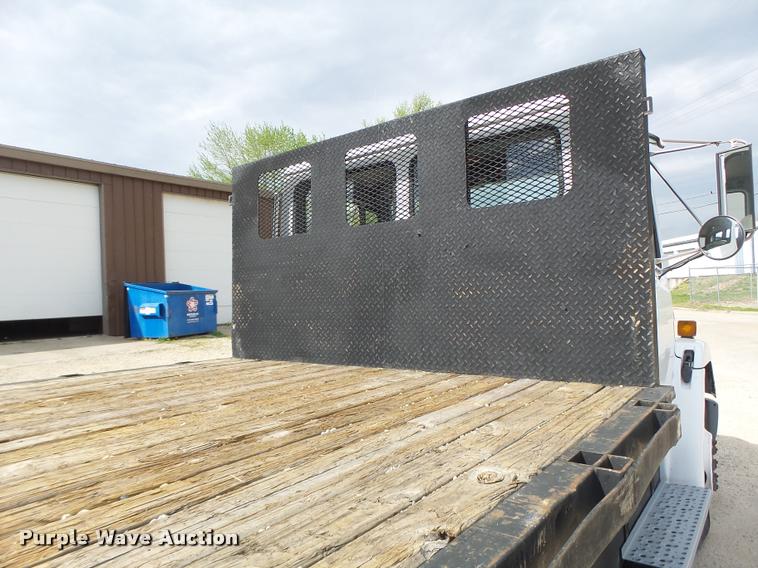 image for item DA3462 1999 Freightliner FL60 flatbed truck