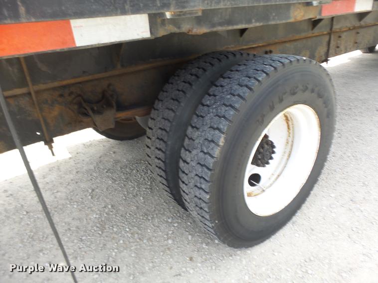 image for item DA3462 1999 Freightliner FL60 flatbed truck