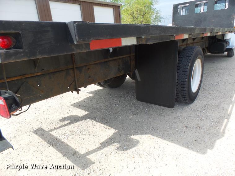 image for item DA3462 1999 Freightliner FL60 flatbed truck