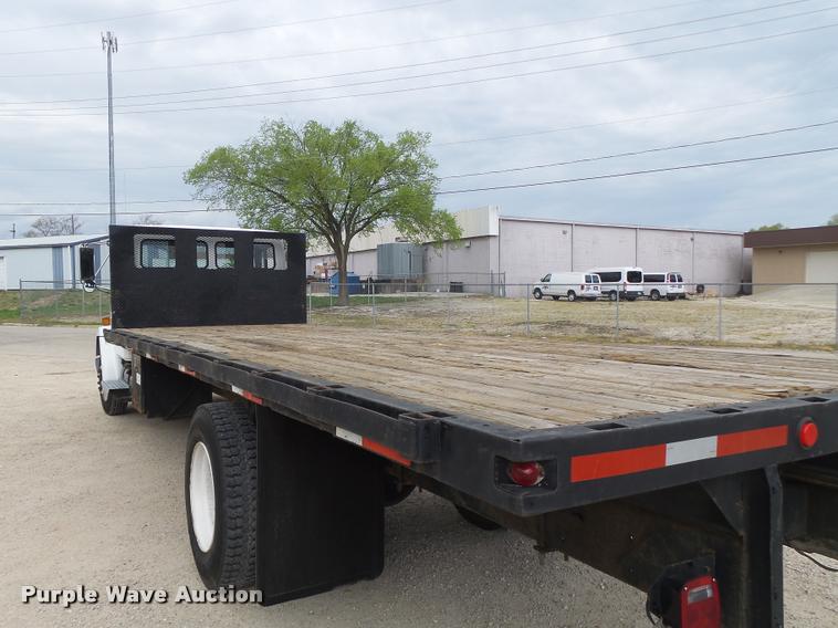 image for item DA3462 1999 Freightliner FL60 flatbed truck