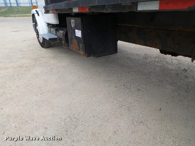 image for item DA3462 1999 Freightliner FL60 flatbed truck