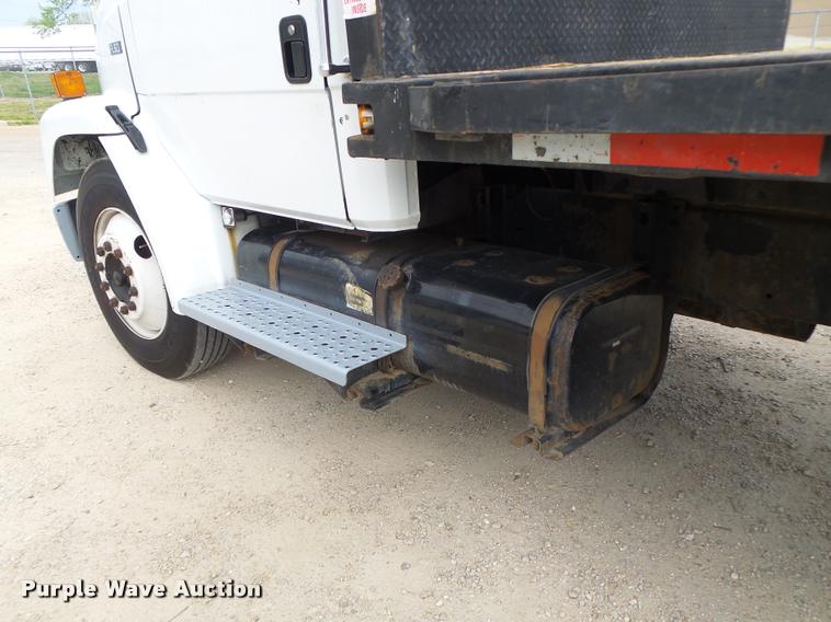 image for item DA3462 1999 Freightliner FL60 flatbed truck