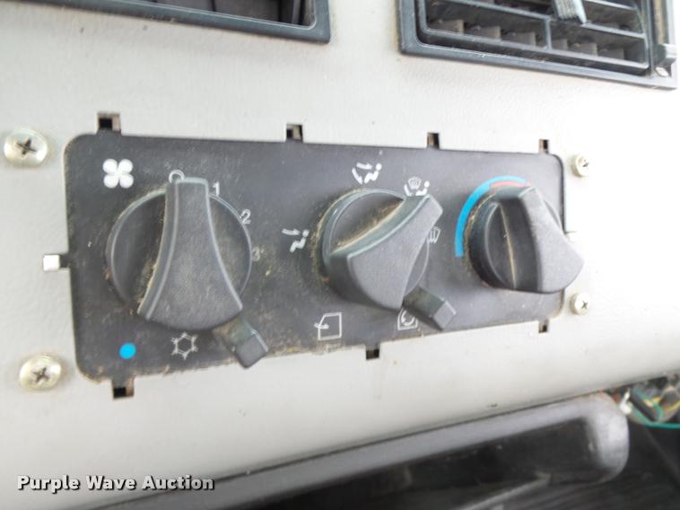 image for item DA3462 1999 Freightliner FL60 flatbed truck