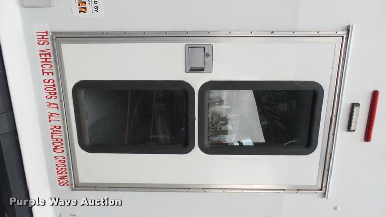 image for item L2392 2009 Ford E450 Super Duty shuttle bus