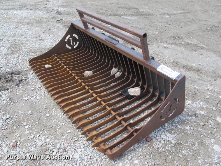 Jenkins rock bucket in Pierre, SD Item K3823 sold Purple Wave