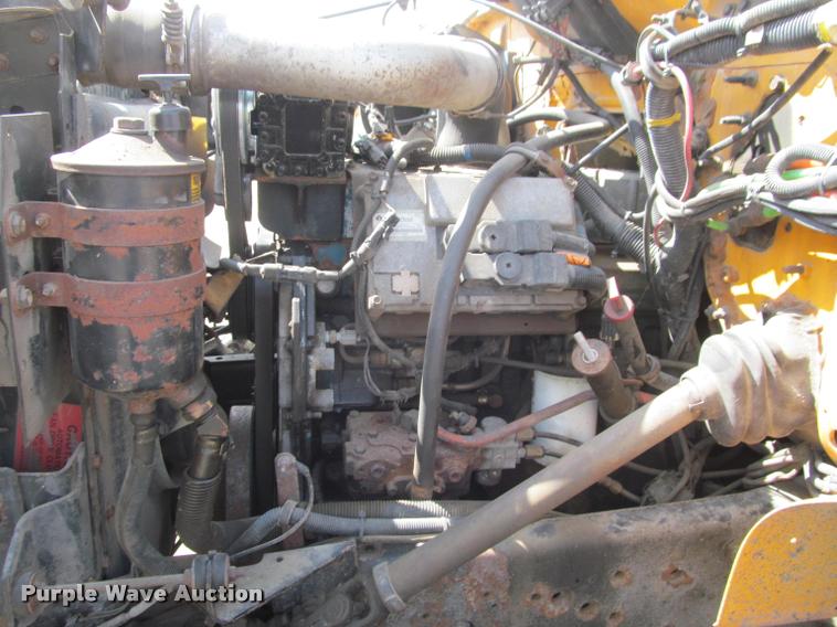 image for item K3950 2002 International 4900 Crew Cab dump truck