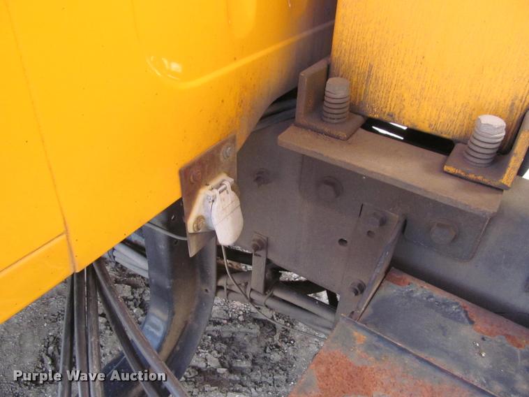 image for item K3950 2002 International 4900 Crew Cab dump truck