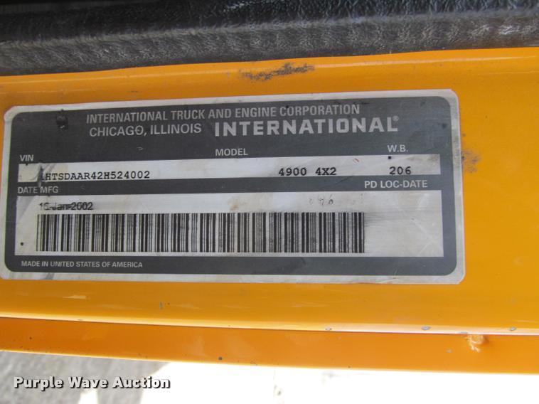 image for item K3950 2002 International 4900 Crew Cab dump truck