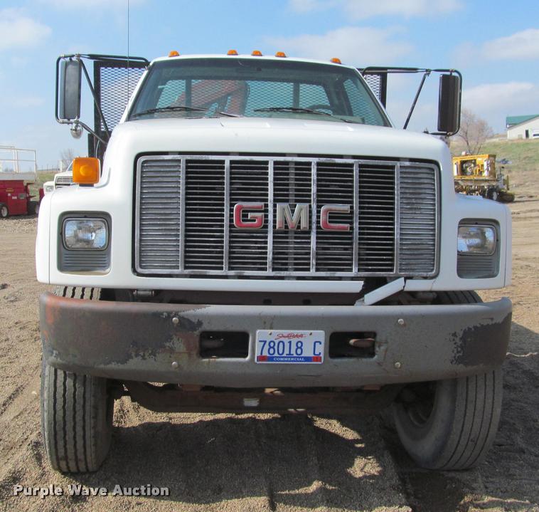 image for item K3988 1995 GMC TopKick TC7H064 flatbed truck with crane