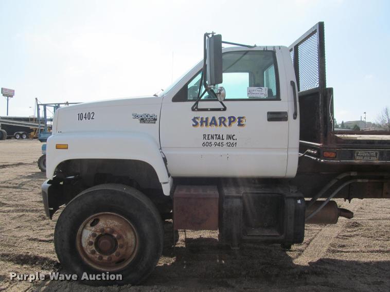 image for item K3988 1995 GMC TopKick TC7H064 flatbed truck with crane
