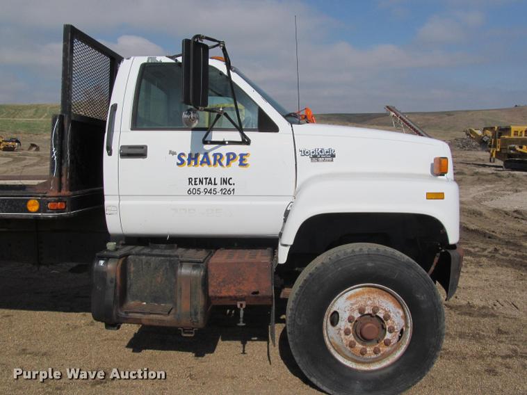 image for item K3988 1995 GMC TopKick TC7H064 flatbed truck with crane