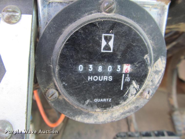 image for item K3988 1995 GMC TopKick TC7H064 flatbed truck with crane