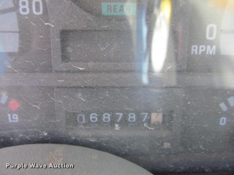 image for item K3988 1995 GMC TopKick TC7H064 flatbed truck with crane