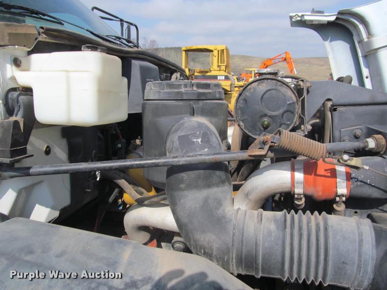 image for item K3988 1995 GMC TopKick TC7H064 flatbed truck with crane