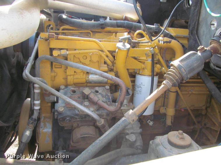 image for item K3988 1995 GMC TopKick TC7H064 flatbed truck with crane