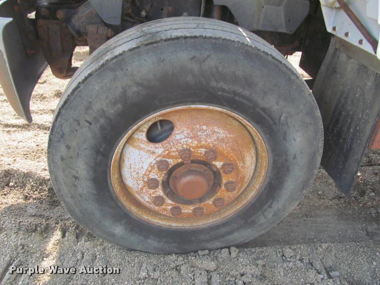 image for item K3988 1995 GMC TopKick TC7H064 flatbed truck with crane