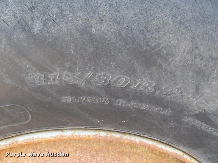 image for item K3988 1995 GMC TopKick TC7H064 flatbed truck with crane