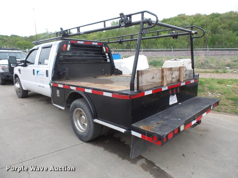 image for item DA8138 2008 Ford F350 Super Duty Crew Cab flatbed pickup truck