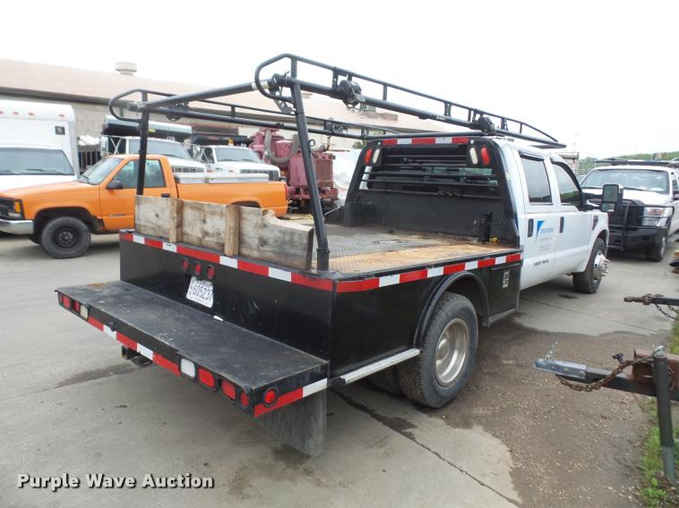 image for item DA8138 2008 Ford F350 Super Duty Crew Cab flatbed pickup truck