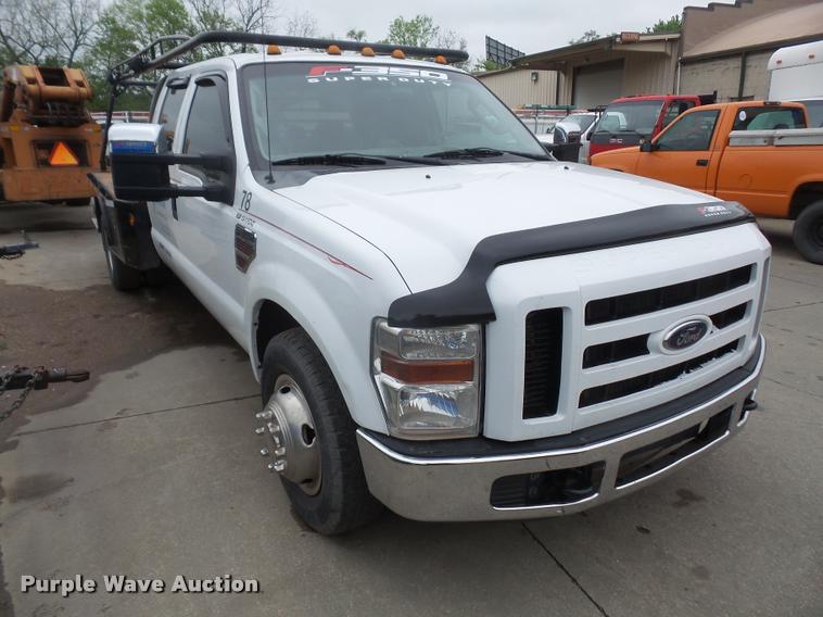 image for item DA8138 2008 Ford F350 Super Duty Crew Cab flatbed pickup truck