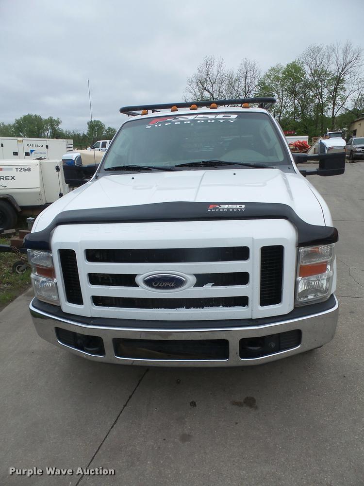 image for item DA8138 2008 Ford F350 Super Duty Crew Cab flatbed pickup truck
