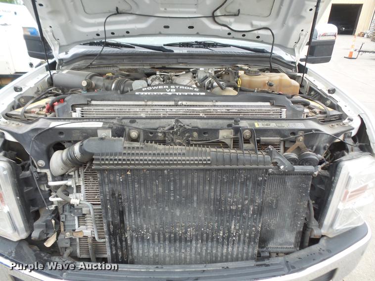 image for item DA8138 2008 Ford F350 Super Duty Crew Cab flatbed pickup truck