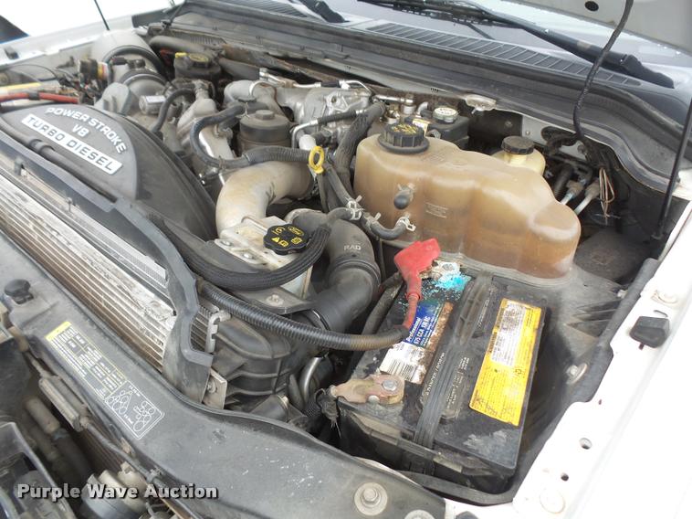 image for item DA8138 2008 Ford F350 Super Duty Crew Cab flatbed pickup truck