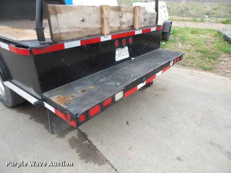 image for item DA8138 2008 Ford F350 Super Duty Crew Cab flatbed pickup truck