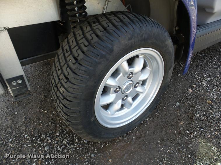 image for item DB0181 2002 Ford Think Neighbor golf cart