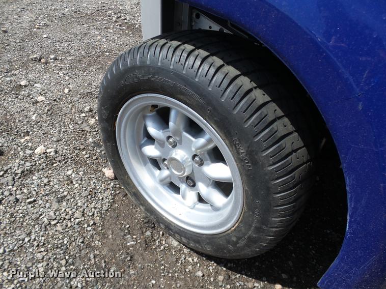 image for item DB0181 2002 Ford Think Neighbor golf cart