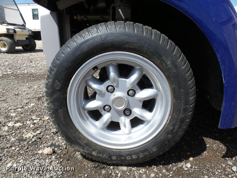 image for item DB0181 2002 Ford Think Neighbor golf cart