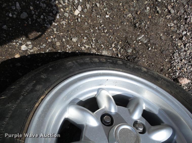 image for item DB0181 2002 Ford Think Neighbor golf cart