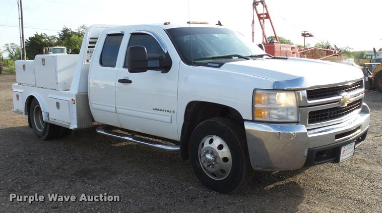 image for item DB0211 2009 Chevrolet Silverado 3500HD LT Ext. Cab flatbed pickup truck