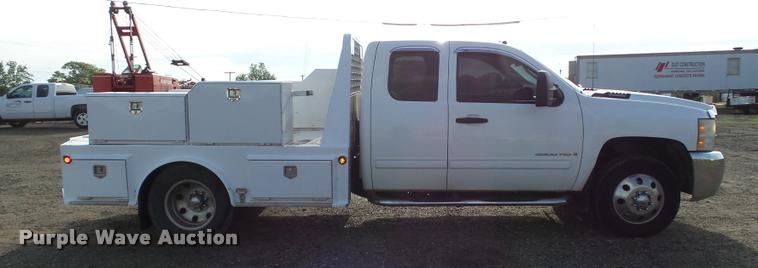 image for item DB0211 2009 Chevrolet Silverado 3500HD LT Ext. Cab flatbed pickup truck
