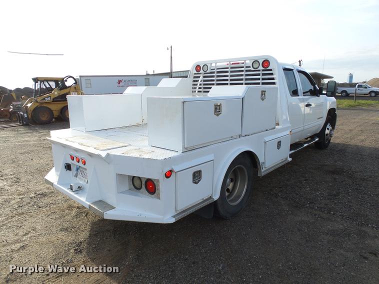 image for item DB0211 2009 Chevrolet Silverado 3500HD LT Ext. Cab flatbed pickup truck
