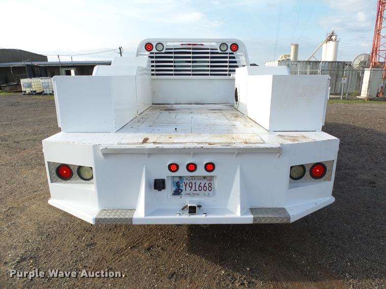 image for item DB0211 2009 Chevrolet Silverado 3500HD LT Ext. Cab flatbed pickup truck