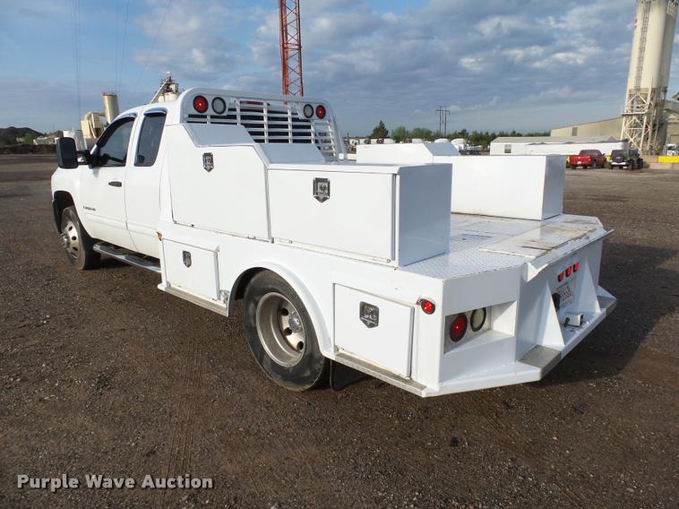 image for item DB0211 2009 Chevrolet Silverado 3500HD LT Ext. Cab flatbed pickup truck