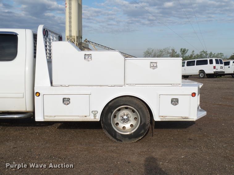 image for item DB0211 2009 Chevrolet Silverado 3500HD LT Ext. Cab flatbed pickup truck