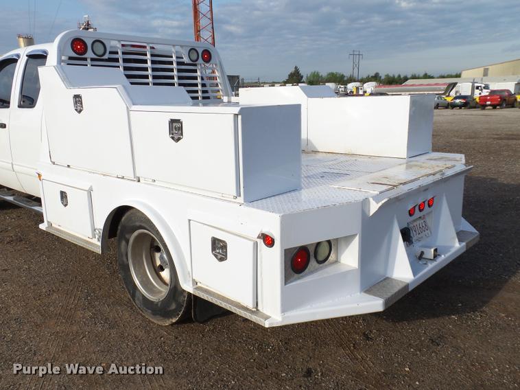 image for item DB0211 2009 Chevrolet Silverado 3500HD LT Ext. Cab flatbed pickup truck