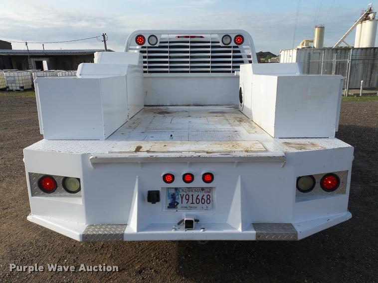 image for item DB0211 2009 Chevrolet Silverado 3500HD LT Ext. Cab flatbed pickup truck