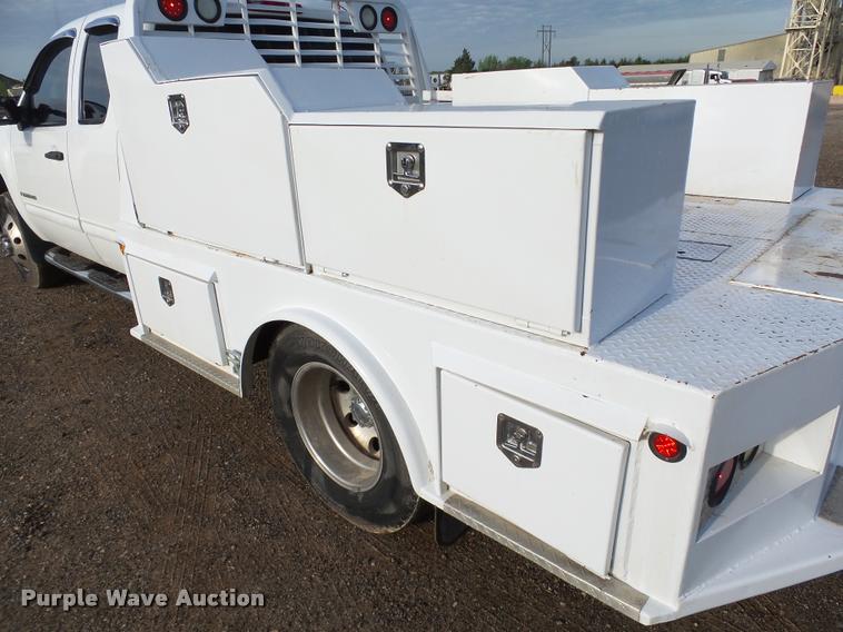 image for item DB0211 2009 Chevrolet Silverado 3500HD LT Ext. Cab flatbed pickup truck