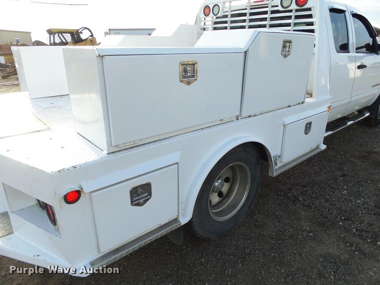 image for item DB0211 2009 Chevrolet Silverado 3500HD LT Ext. Cab flatbed pickup truck