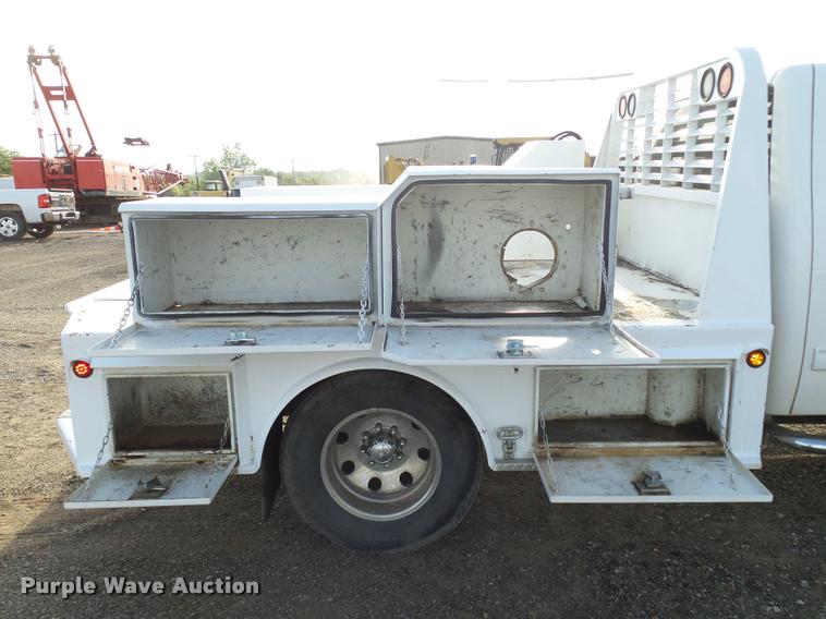 image for item DB0211 2009 Chevrolet Silverado 3500HD LT Ext. Cab flatbed pickup truck