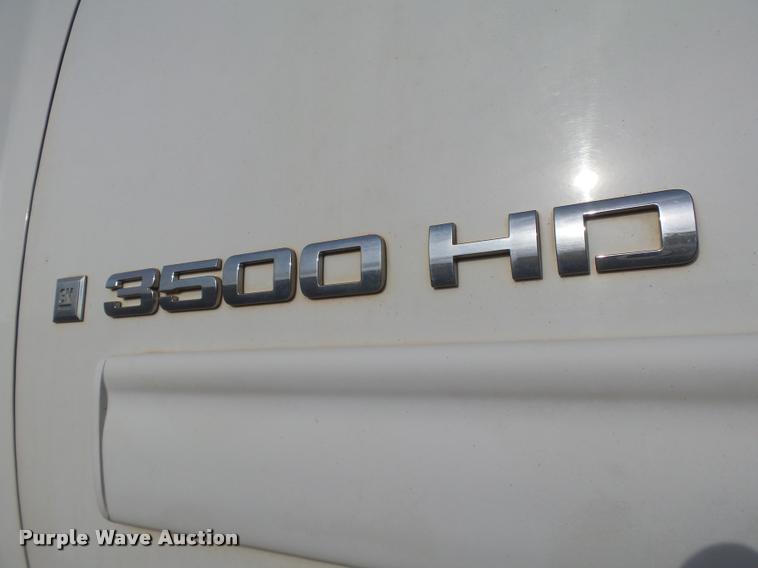 image for item DB0211 2009 Chevrolet Silverado 3500HD LT Ext. Cab flatbed pickup truck