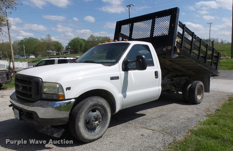image for item DB1307 2004 Ford F350 flat dump bed pickup truck