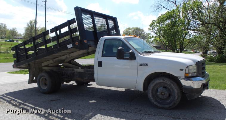 image for item DB1307 2004 Ford F350 flat dump bed pickup truck