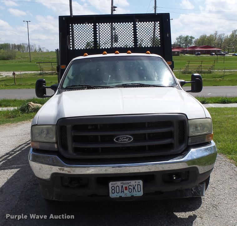 image for item DB1307 2004 Ford F350 flat dump bed pickup truck